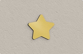 Metallschilder - Sternform als freier Blickfang - brosse-or - glue-cutout - cutout-at-sternform-aus-goldfarbenem-aluminium-fassade