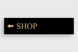 Hotel Signs - Directional Sign to Shop - noir-or - glue - en-uk-area-tourism-hotel-arrow-008-3-1748945984749