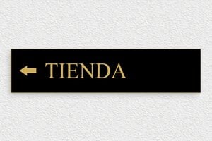 Señalética para Hotel - Señalización hacia la tienda - undefined - noir-or - glue - es-area-turismo-hotel-flecha-008-3-1747818138432